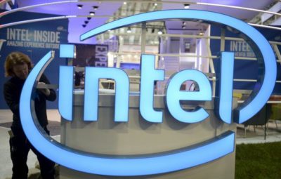 A worker arranges an Intel logo at the CeBIT trade fair, the world's biggest computer and software fair, in Hannover in this March 13, 2016, file photo. REUTERS/Nigel Treblin/Files