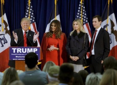 U.S. Republican presidential candidate Donald Trump speaks as (L-R) his wife Melania, daughter Ivanka and Ivanka's husband Jared Kushner listen, at a campaign rally on caucus day in Waterloo, Iowa February 1, 2016.   REUTERS/Rick Wilking