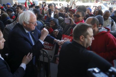 U.S. Democratic presidential candidate and U.S. Senator Bernie Sanders greets Communications Workers of America (CWA) workers striking against Verizon in Brooklyn, New York April 13, 2016.  REUTERS/Brian Snyder