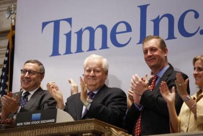 Time Inc. CEO Joe Ripp (2nd L) claps after ringing the bell to open trading at the New York Stock Exchange in New York June 9, 2014.  REUTERS/Carlo Allegri